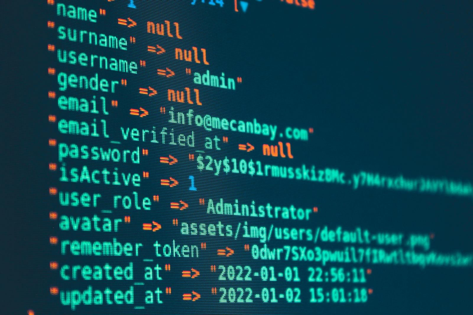 Vibrant close-up of code displayed on a monitor with various programming details.