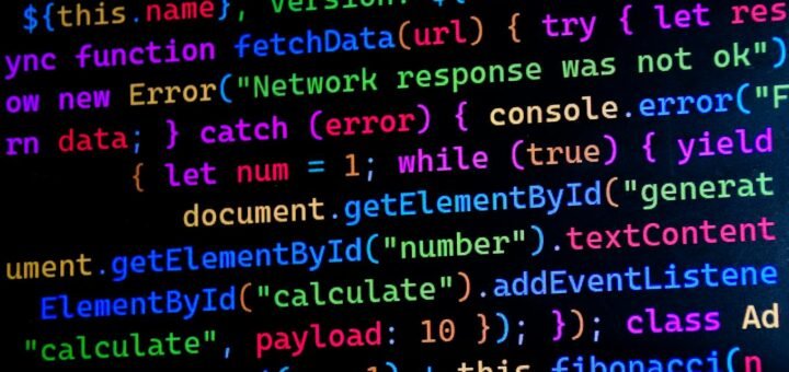 Close-up of colorful JavaScript code displayed on a computer monitor, ideal for tech-themed projects.