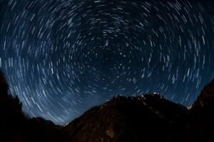 Long exposure of star trails over Alagna Valsesia, Italy's night sky